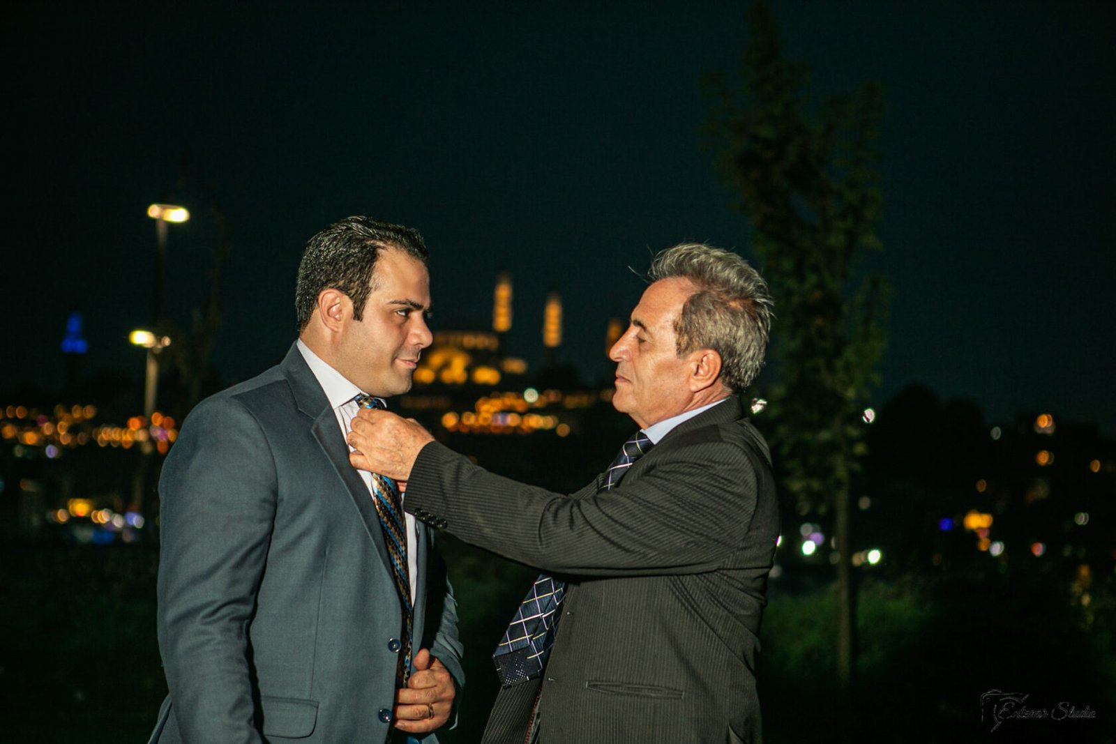 Father and son-in-law family photography at night in Istanbul by Entezar Studio