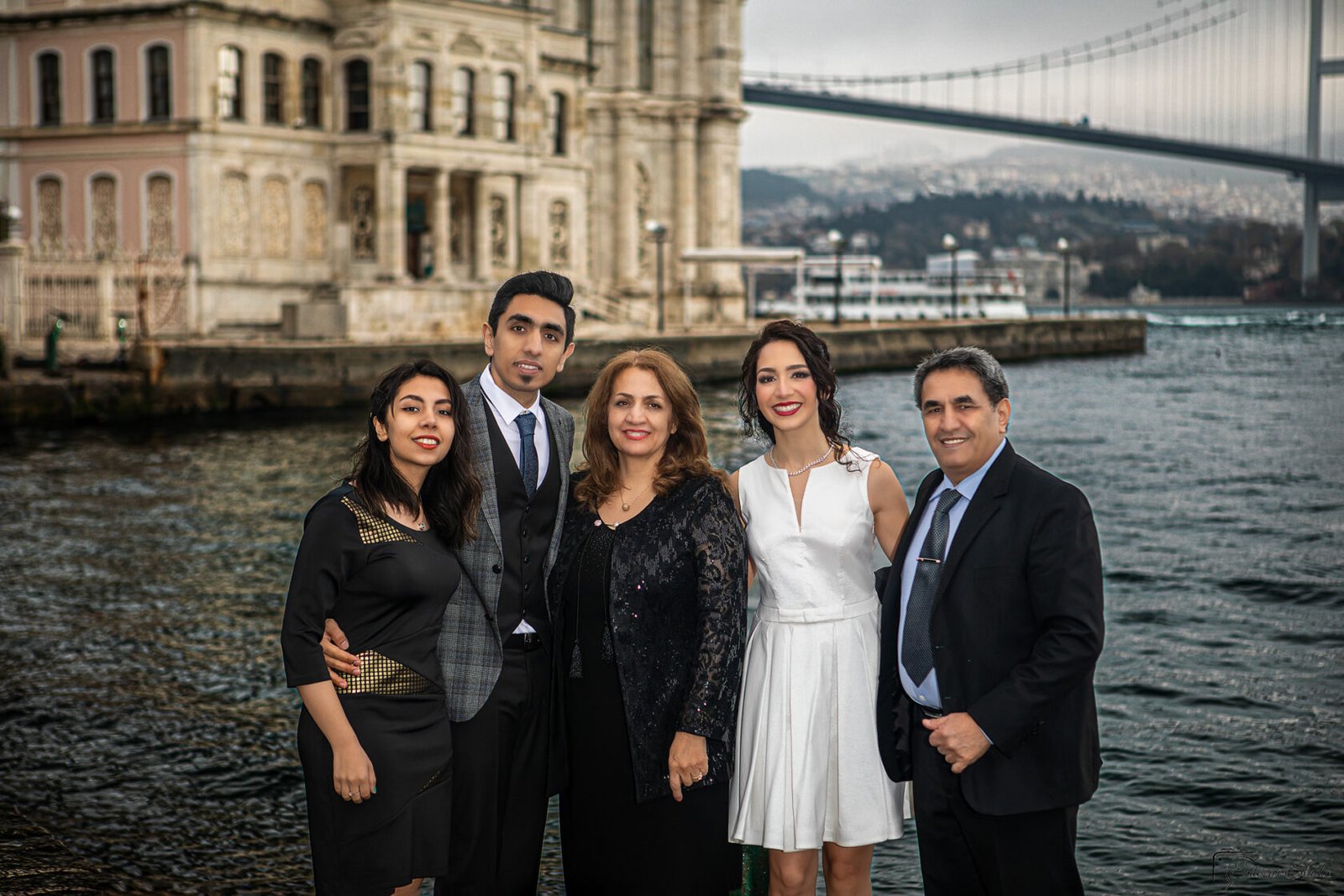 Family photography by the Bosphorus Bridge in Istanbul by Entezar Studio