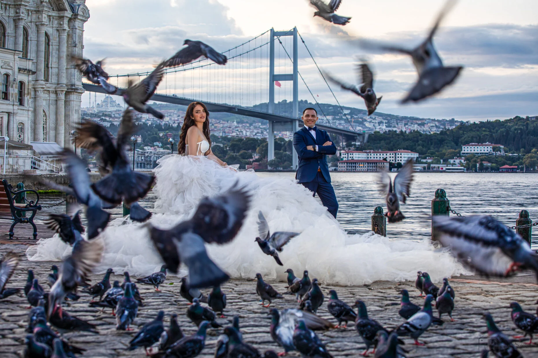 Wedding Photography by the Bosphorus Strait with flying dress in Istanbul by Entezar Studio