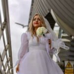 Cool bridal photography on the Golden Horn Bridge in Istanbul by Entezar Studio