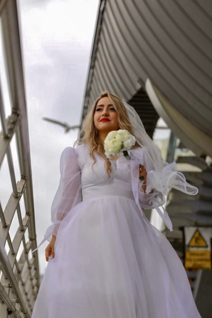 Cool bridal photography on the Golden Horn Bridge in Istanbul by Entezar Studio